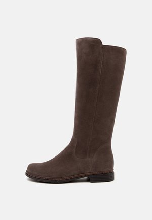 Tall brown suede boot with low black heel, round toe, and simple stitching, displayed against a plain white background.