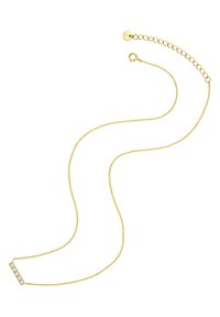 Guldtonad kedjehalsband som har en förlängd stav med tre klara stenar. Kedjan har en delikat, länkad design med ett krabba-lås.