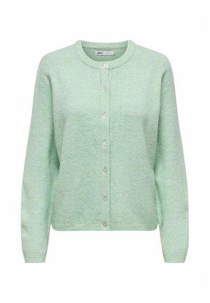 Gaišzaļš džemperis no adīta auduma, ar garām piedurknēm, apaļu kakla izgriezumu un sešu pogu priekšējo aizdari. Tekstūru apdare.