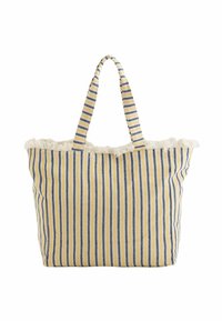 Sac fourre-tout rayé avec des lignes verticales bleues et jaunes, en matériau textile doux, et bords supérieurs effilochés. Deux poignées tressées pour un transport facile.
