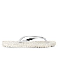 White flip-flop with crossed straps. Sole features a braided texture. Lightweight design with a minimalistic style.