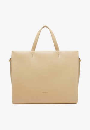Beige leather tote bag with two handles, flat design, subtle stitching details, and a gold logo at the bottom center.