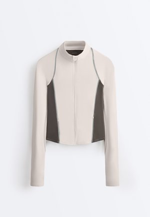 OYSHO LIGHT WARM REFLECTIVE TECHNICAL - Veste de survêtement - beige