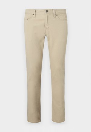 Béžové bavlněné kalhoty s rovnými nohavicemi, pěti kapsami a zapínáním na knoflíky vpředu. Jsou zdobené jemným prošitím a mají hladkou texturu.