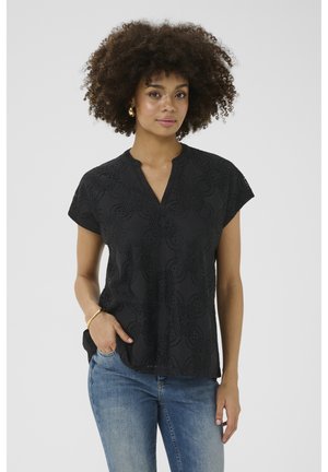 Blusa nera con maniche corte, caratterizzata da un motivo in pizzo floreale e una scollatura a V. Tessuto testurizzato, vestibilità rilassata, orlo a livello dell'anca.