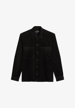 Black corduroy shirt with long sleeves, button front, classic collar, and two chest pockets. Soft texture with vertical ridges.