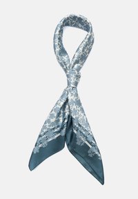 Foulard en soie avec un motif floral dans des teintes de bleu, d'une texture lisse et aux extrémités pointues, noué en boucle au centre.