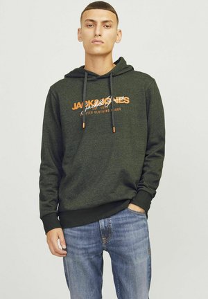 Dark green hoodie with drawstring, featuring a logo in orange. Paired with blue jeans, both are made from soft cotton fabric.