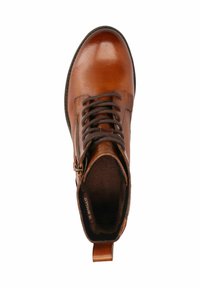 Braune Leder-Stiefelette, abgerundete Zehenpartie, Schnürung vorne, seitlicher Reißverschluss, weiche Innenausstattung, flache Gummisohle, glatte Oberfläche.