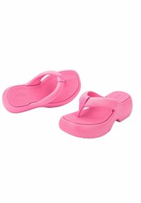 Infradito rosa con suola spessa in gomma, dotate di una fascia per le dita a forma di V e un ampio plantare per il massimo comfort. Texture liscia su tutta la superficie.