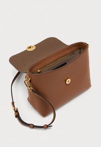 Brown leather crossbody handbag with gold clasp, adjustable strap, and interior zippered pocket, shown open on a white background.