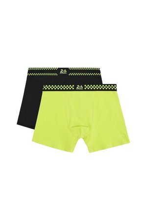 Dwie pary bokserek: jedna czarna, druga neonowożółta, każda z czarno-żółtym, kratkowanym paskiem w talii oznaczonym napisem "24h LE MANS".