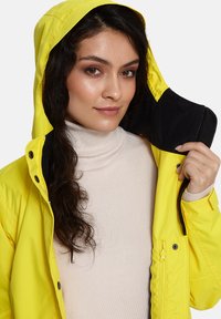 Huppa JANELLE - Lengva striukė - yellow