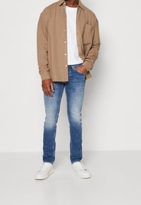 Replay Vaqueros tapered - blue denim