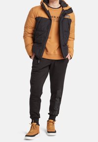 Timberland Zimní bunda - mustard yellow