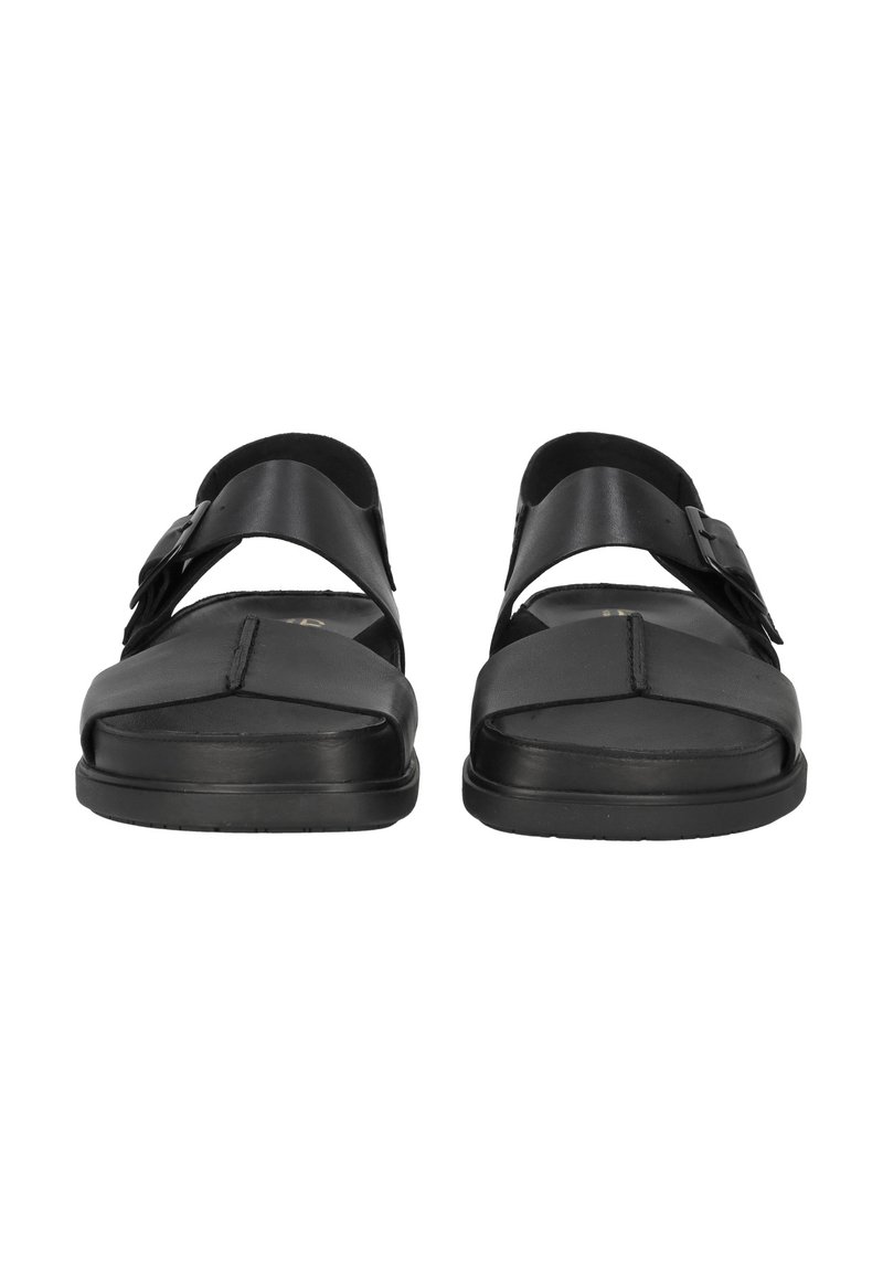 Sandali in pelle nera con cinturini, caratterizzati da un design a ciabatta, una suola piatta e una fibbia laterale per la regolazione.