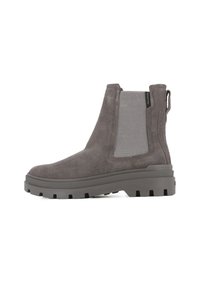 Bottine en suède gris avec des panneaux latéraux élastiques, semelle en caoutchouc texturée et tirant à l'arrière. Son design est épuré et moderne.