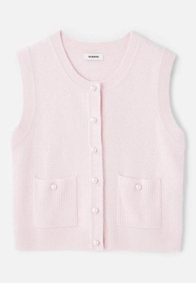 Roze mouwloze cardigan met een gestructureerde afwerking, voorzien van voorzakken, parelknopen en een ribbelboord aan de halslijn en onderrand.
