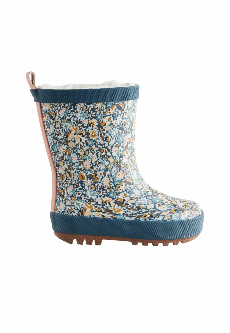 Stivale di gomma floreale con motivo blu, accenti laterali rosa, suola texturizzata e una fodera in pelliccia bianca nella parte superiore. Ideale per condizioni di bagnato.