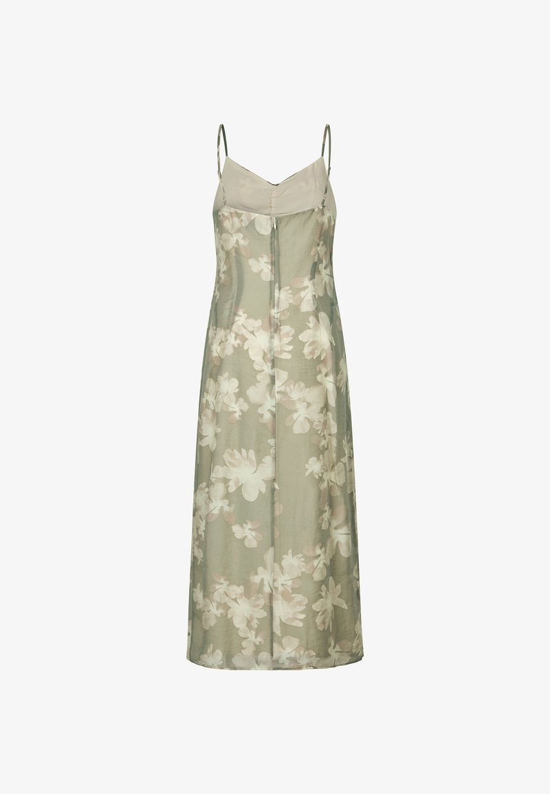 Rochie maxi florală în verde deschis cu flori albe mari și moi. Dispune de bretele subțiri, decolteu în V și o siluetă elegantă. Material ușor.