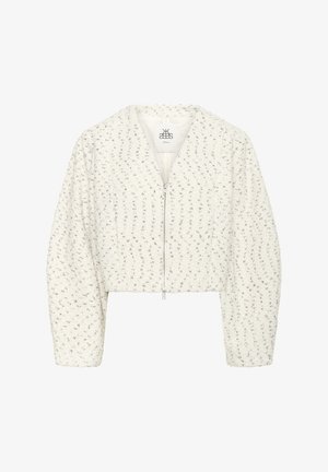 Witte cropped jas met een gestructureerde stof, zilveren glinsters en een ritssluiting. Heeft een V-hals en volumineuze, licht geplooide mouwen.
