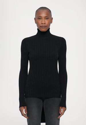 Black ribbed turtleneck sweater with long sleeves, side slits, and a close-fitting design, made from a smooth, stretchy fabric.