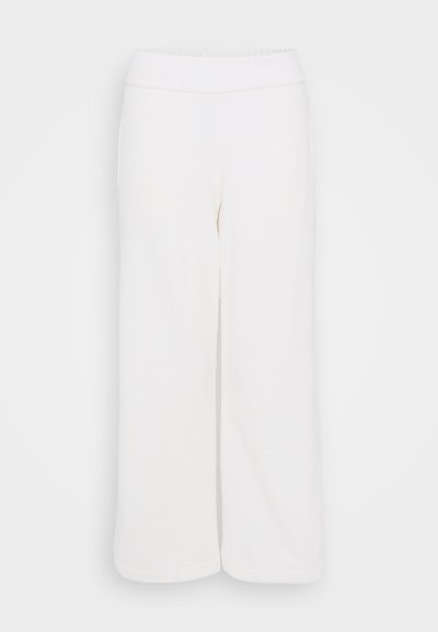 White, fluffy, wide-leg pants with a soft texture and an elastic waistband. Features two side pockets and a loose fit.