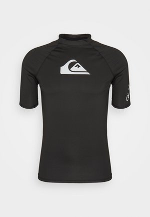 Short-sleeved black rash guard made of stretchy fabric, featuring a white logo on the chest and branding on the right sleeve.
