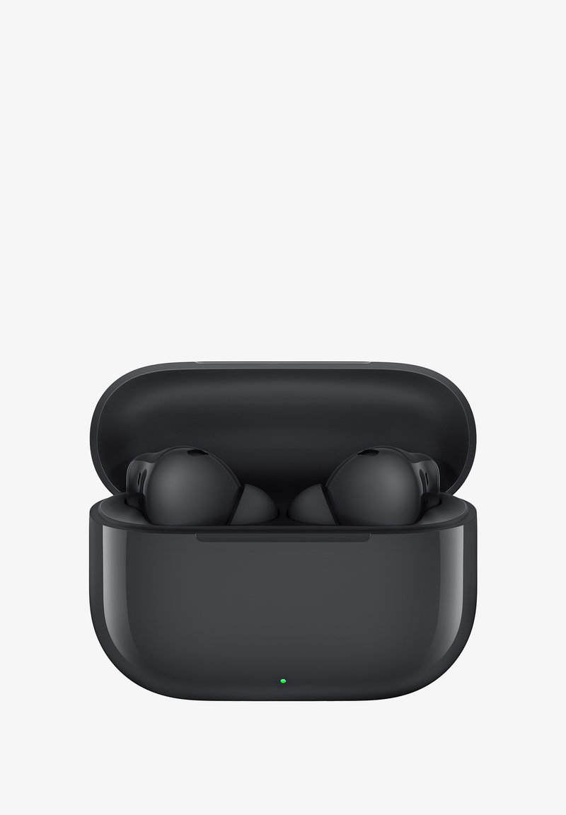 Wireless earbuds with a glossy black charging case, lid open, showcasing rounded earbuds inside and a small green status light.
