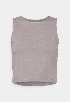 Débardeur court sans manches gris clair avec un col rond et un tissu uni et lisse.