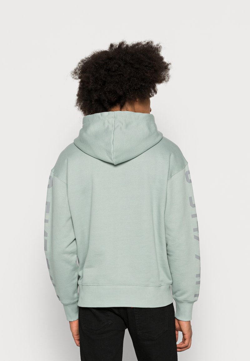Herren Kapuzenpullover | G-Star SLEEVE GRAPHICS LOOSE Sweatshirt iceberg green/grün - UR50200 Herren Kapuzenpullover | G-Star SLEEVE GRAPHICS LOOSE Sweatshirt iceberg green/grün - UR50200