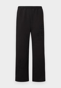 Μαύροι φόρμες από μαλακό ύφασμα, με ελαστική μέση και διακριτικά σχέδια σταυρών στο κάτω μέρος των ποδιών. Σχεδιασμός με ίσια γραμμή στα πόδια.