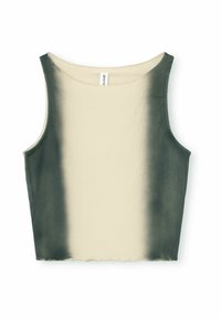 Svart och crème ribbad crop top med en gradientfärgeffekt. Har en scoop-halsringning och rå kant nertill. Mjuk bomullsmaterial.