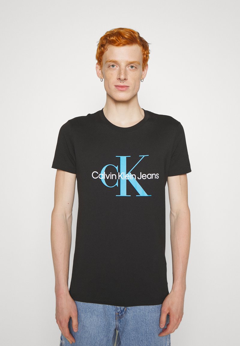 Calvin Klein Jeans SEASONAL MONOLOGO TEE - Apdrukāts T-krekls - black