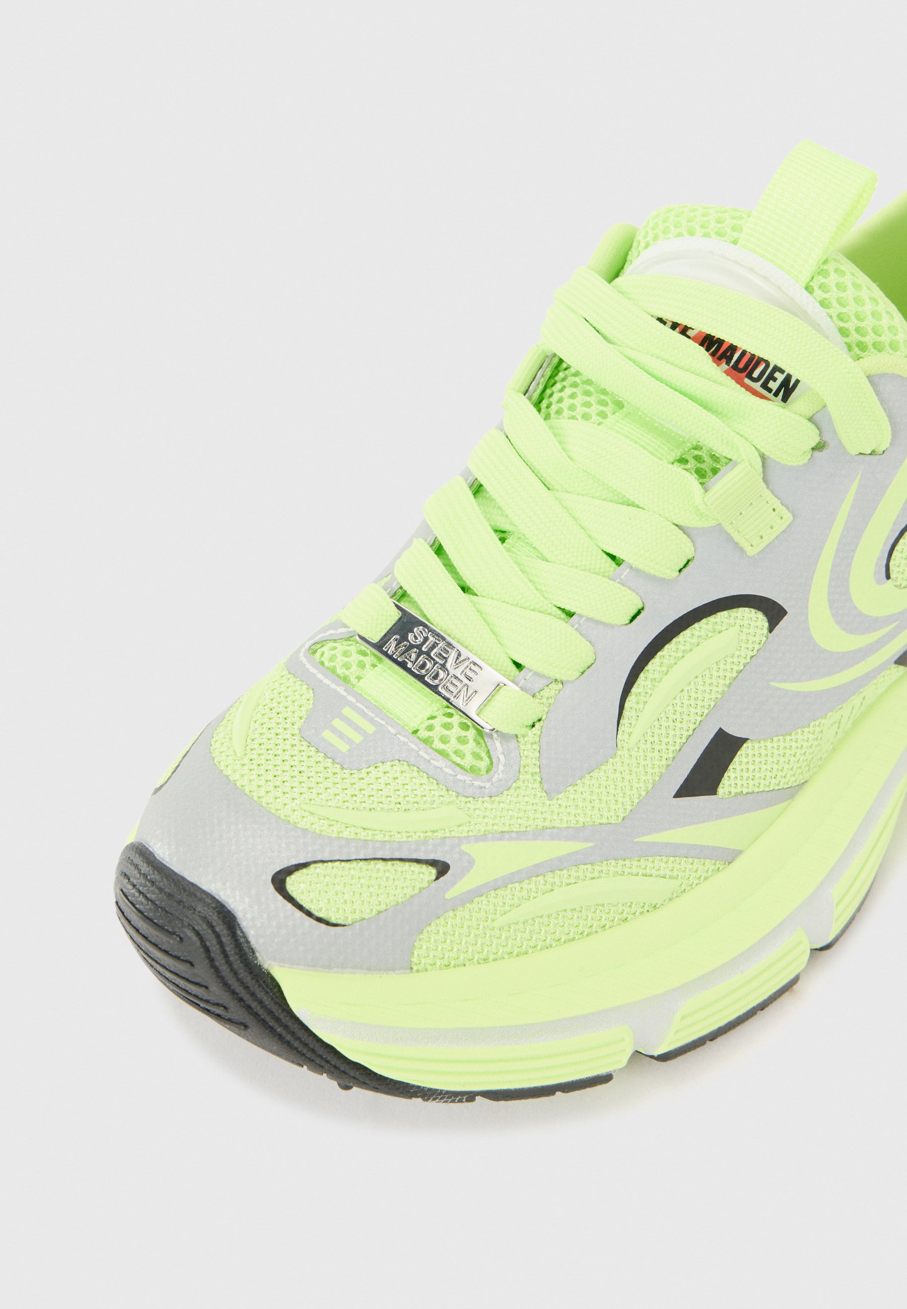 luminous green trainers