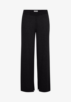 Črne široke hlače iz mehkega materiala. Imajo raztegljiv pas in stranske razpoke na robu za olajšano gibanje.