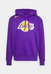Sweat à capuche violet avec le logo des Los Angeles Lakers et le swoosh jaune Nike sur la poitrine, avec une poche avant et des cordons.