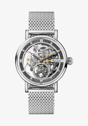 Silberner Edelstahluhren mit transparentem Skelettzifferblatt, Mesh-Armband, römischen Ziffern und filigranen Zahndetails. Blaue und gelbe Akzente.