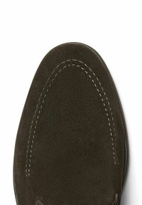 Dark green suede shoe with a rounded toe, featuring contrasting white stitching along the edge and a smooth leather sole.