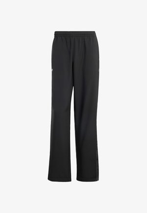 Black, lightweight athletic pants with an elastic waistband, side zippers, and a relaxed fit. Smooth texture, minimal branding.