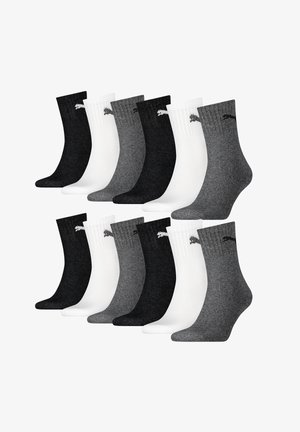 Set aus 12 Crew-Socken in Schwarz, Weiß und Grau. Mit gerippter Textur und einem Logo am Bund. Weiches Material und Design in mittlerer Absatzhöhe.