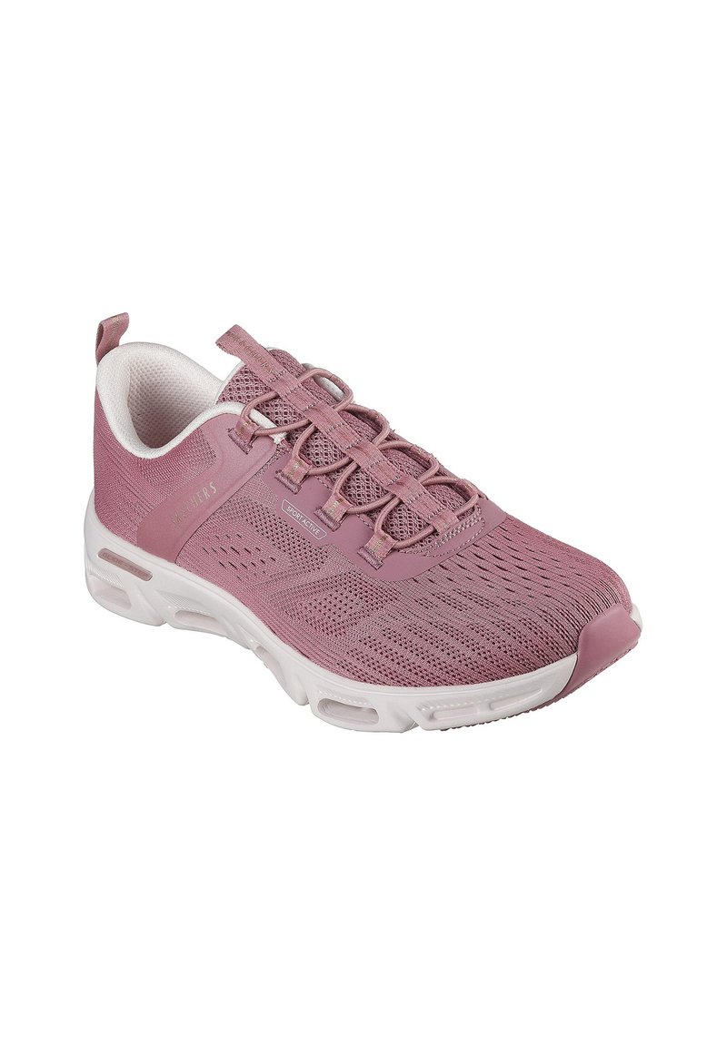 Zapatilla deportiva rosa con parte superior de malla, diseño flexible y cuello acolchado. Presenta una suela blanca ligera con bolsas de aire para amortiguación.