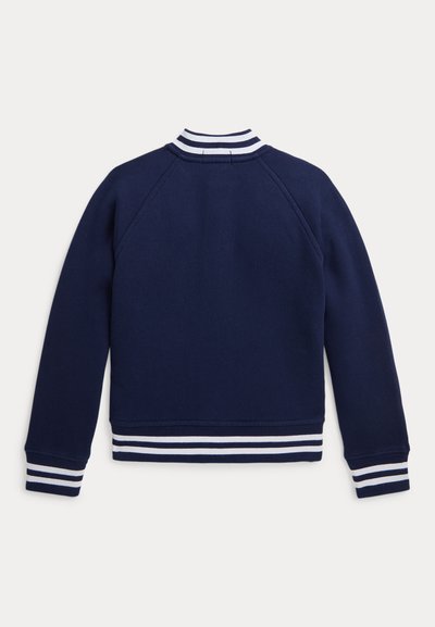 Sweatshirt azul-marinho com colarinho e punhos canelados, apresentando riscas brancas; feito de tecido texturizado com um design limpo e ajustado.