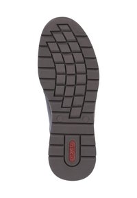 Suola di scarpa in gomma marrone con un modello di battistrada testurizzato e scanalature, un logo circolare centrale e dettagli in rilievo.