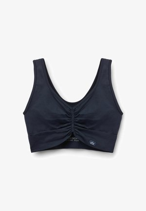 Navyblaues trägerloses Oberteil aus weichem Stoff, mit einem gerafften Design an der Vorderseite und breiten Trägern zur Unterstützung. Etikett sichtbar.