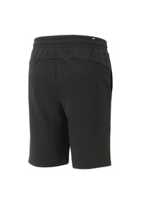 Sorte shorts med elastisk talje, lavet af blødt stof. Har to sidelommer og et logo detaljeret på taljen.