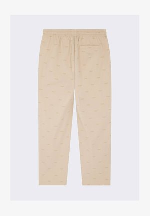 Pantalones de algodón beige con una cintura elástica, que presentan un patrón repetido de "PXP" en toda su superficie y un bolsillo trasero.