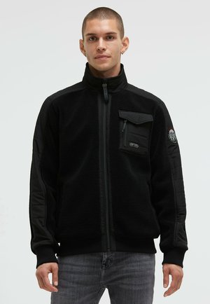 IM TONIGEN MATERIALMIX - Fleece jacket - black