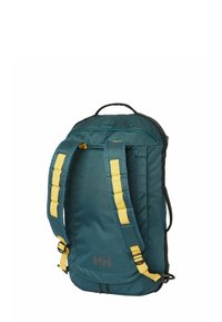 Sac à dos bleu sarcelle en tissu texturé avec des sangles jaunes, une bordure noire et une poignée supérieure. Doté de fermetures éclair et d'un système de sangles réglables.