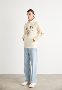 GANT FRONT GRAPHIC  - Mikina s kapucňou - cream
